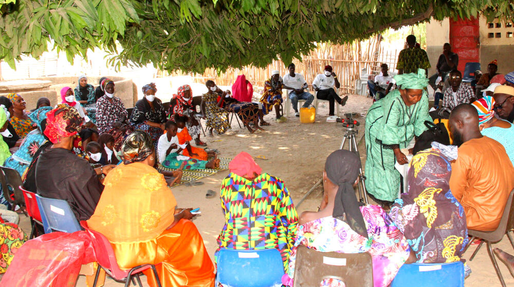 Community members of Kolior, Lower River Region gather to build consensus on their collective abandonment of FGM 