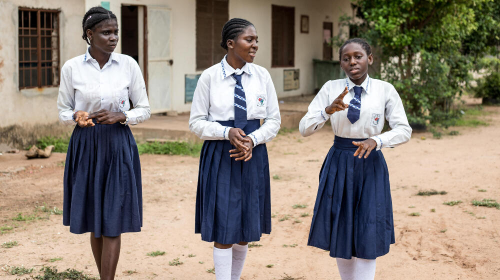 Mariama Jobe, 17 (left) Isatou Ceesay, 21 (center) and Fatoumattta Keita, 17 (right) in school after a conversation on menstrual